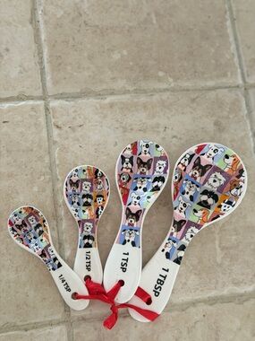 Ceramic whimsical dog breed measuring spoon set.